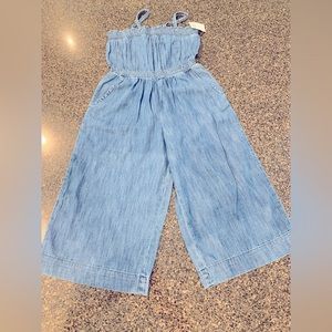 GAP kids light blue denim romper with wide legs and tube top spaghetti straps